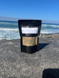 Onyx & Jade Tea Company Breath Tea pouch, featuring a caffeine free mint and citrus herbal blend with mullein, marshmallow root, ginger, spearmint, and thyme.
