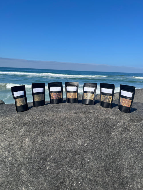Founder’s Starter Bag Kit from Onyx & Jade Tea Company featuring seven original loose-leaf tea pouches and one 12 oz jar of Pure Honey displayed together.
