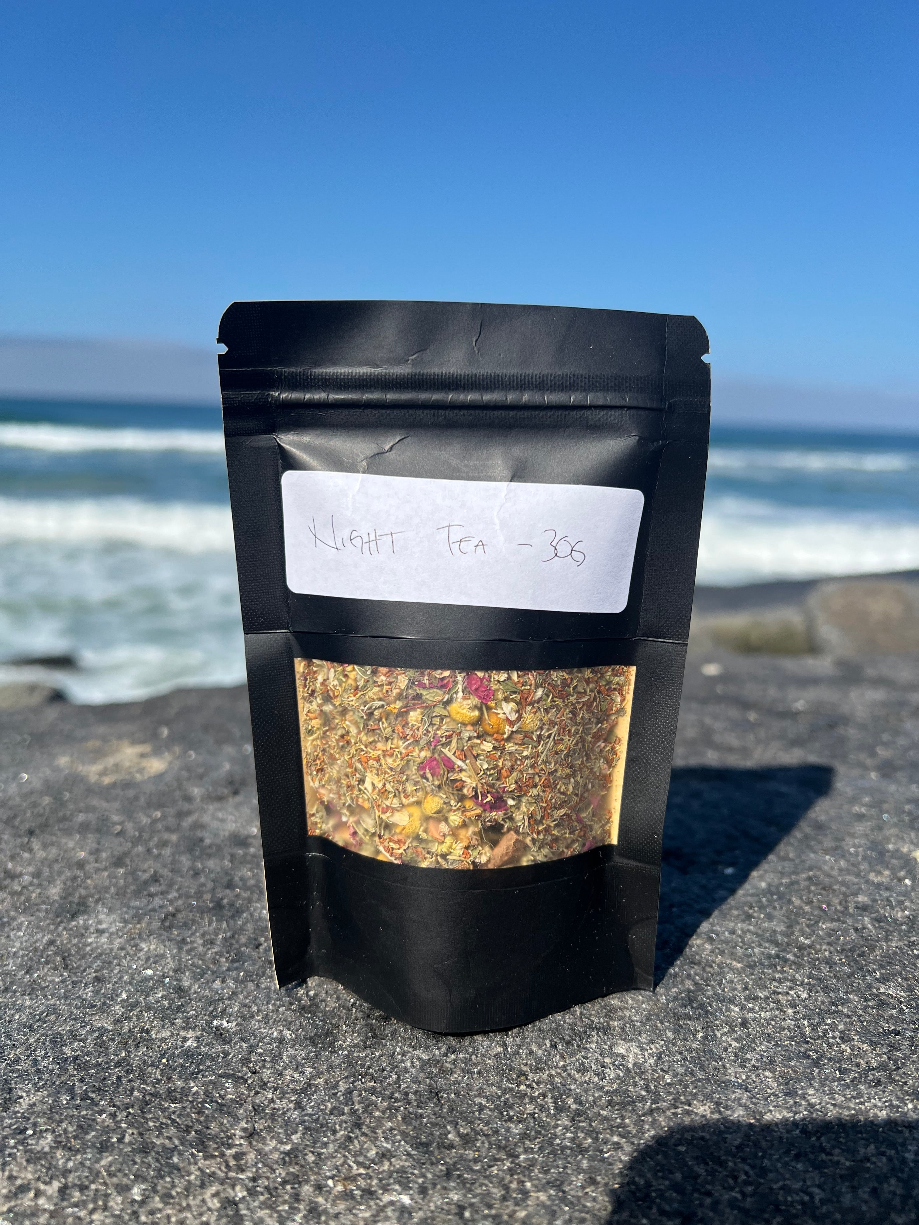 Onyx & Jade Tea Company Night Tea pouch, featuring a caffeine free chamomile, honeybush, and rooibos evening blend with citrus, cinnamon, lemon balm, and lavender.